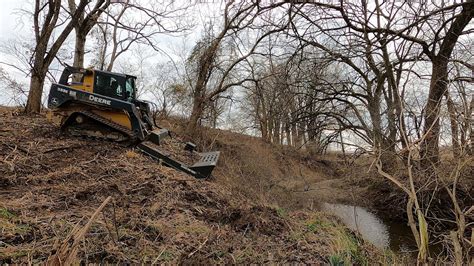 clearing woods with skid steer|forester attachment for skid steer.